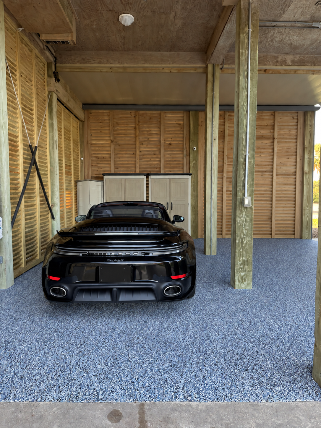 Rear view with the black convertible roof lowered